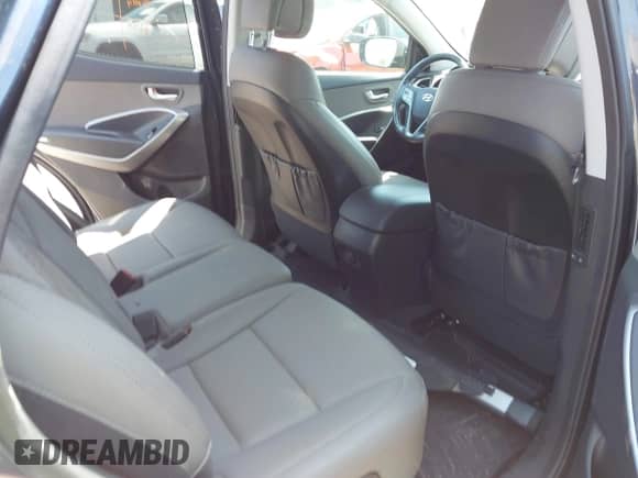 2016 Hyundai Santa Fe with VIN 5XYZUDLA7GG357896, listed as a IAAI auction lot 42808592 with 50,159 mi miles and . Bid and sale history available at DreamBid. Image 8.