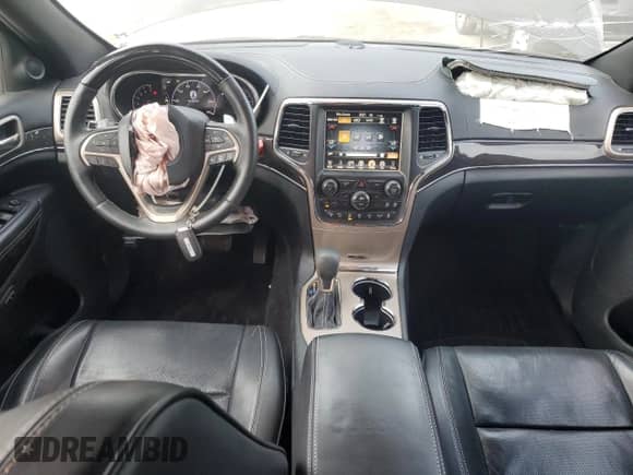 2017 Jeep Grand Cherokee Overland with VIN 1C4RJFCG4HC624457, listed as a Copart auction lot 60759955 with 130,595 mi miles and Salvage title. Bid and sale history available at DreamBid. Image 8.