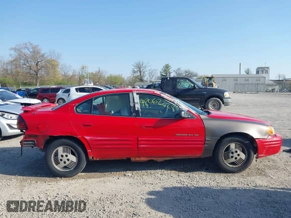2001 Pontiac Grand Am SE1 with VIN 1G2NF52T41C202658, listed as a IAAI auction lot 42062228 with 127,215 mi miles and . Bid and sale history available at DreamBid. Image 13.
