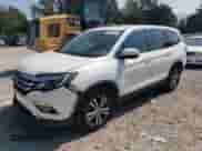 2017 Honda Pilot EX-L with VIN 5FNYF5H56HB046007, listed as a Copart auction lot 80891975 with 134,589 mi miles and Salvage title. Bid and sale history available at DreamBid. Image 1.