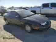 1997 Saturn SC with VIN 1G8ZF1286VZ266912, listed as a Copart auction lot 46953875 with 149,017 mi miles and Salvage title. Bid and sale history available at DreamBid. Image 4.