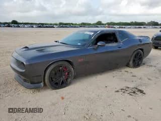 2016 Dodge Challenger SRT 392 with VIN 2C3CDZDJ7GH222022, listed as a Copart auction lot 61614865 with 24,246 mi miles and Clean title. Bid and sale history available at DreamBid. Image 1.