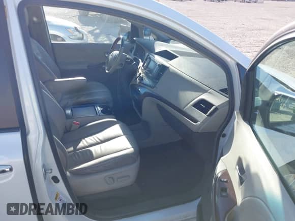 2011 Toyota Sienna XLE AAS with VIN 5TDYK3DC8BS013422, listed as a IAAI auction lot 43349859 with 231,290 mi miles and . Bid and sale history available at DreamBid. Image 5.