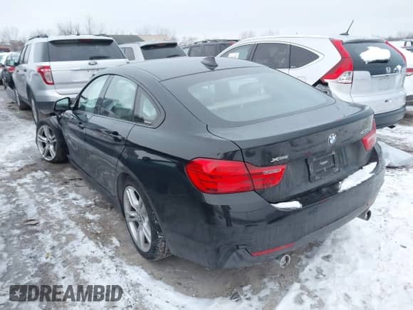 2015 BMW 4 Series 435i xDrive z VIN WBA4B3C55FGV48206, wystawiony jako IAAI lot #41365617 z przebiegiem 78 438 mil mil oraz . Historia ofert i sprzedaży dostępna na DreamBid. Obrazek 3.