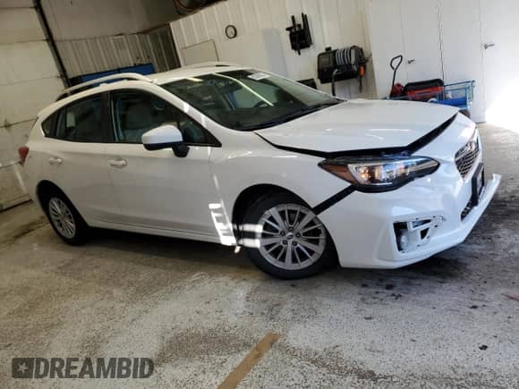 2018 Subaru Impreza Premium with VIN 4S3GTAD69J3731259, listed as a Copart auction lot 80386055 with 72,982 mi miles and Salvage title. Bid and sale history available at DreamBid. Image 4.