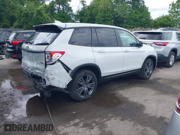 2021 Honda Passport EX-L с VIN 5FNYF8H54MB041738, выставлен на аукционе IAAI как лот 42310470 с пробегом 52 409 миль миль и . История ставок и продаж доступна на DreamBid. Изображение 4.