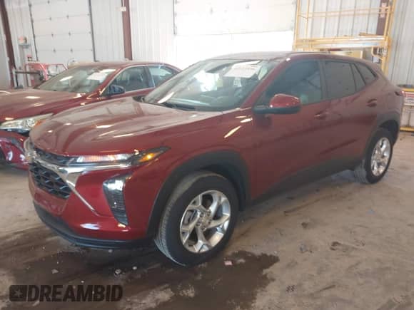 2024 Chevrolet Trax LS with VIN KL77LFE21RC007308, listed as a IAAI auction lot 43123936 with 17,780 mi miles and . Bid and sale history available at DreamBid. Image 2.