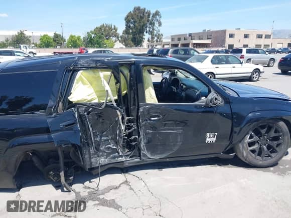 2007 Chevrolet TrailBlazer SS z VIN 1GNES13H772188044, wystawiony jako IAAI lot #42279011 z przebiegiem Nie podano mil oraz . Historia ofert i sprzedaży dostępna na DreamBid. Obrazek 13.
