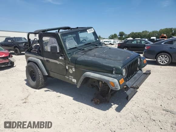 1997 Jeep Wrangler SE с VIN 1J4FY29P3VP508471, выставлен на аукционе Copart как лот 70949895 с пробегом 168 706 миль миль и Списание • Salvage title. История ставок и продаж доступна на DreamBid. Изображение 4.