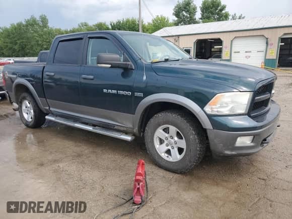 2011 Ram 1500 Outdoorsman with VIN 1D7RV1CT8BS540424, listed as a Copart auction lot 68421885 with 130,083 mi miles and Salvage title. Bid and sale history available at DreamBid. Image 4.
