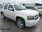 2012 Chevrolet Tahoe LTZ z VIN 1GNSCCE06CR305746, wystawiony jako IAAI lot #41852437 z przebiegiem 198 372 mil mil oraz . Historia ofert i sprzedaży dostępna na DreamBid. Obrazek 1.