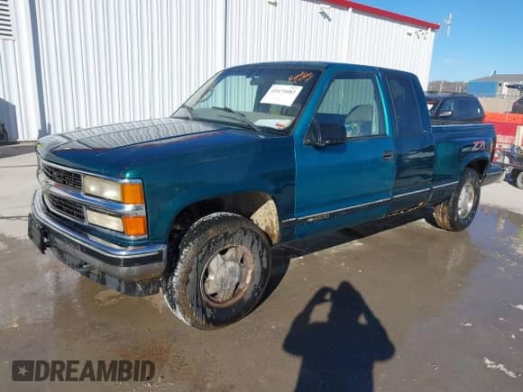 1997 Chevrolet Silverado 1500 with VIN 2GCEK19RXV1115899, listed as a IAAI auction lot 41671682 with 291,289 mi miles and . Bid and sale history available at DreamBid. Image 2.