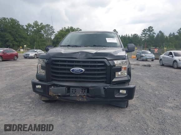 2017 Ford F-150 XL with VIN 1FTEX1CP5HKE14648, listed as a IAAI auction lot 42851598 with 209,985 mi miles and . Bid and sale history available at DreamBid. Image 12.