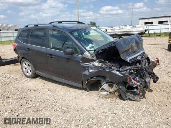 2014 Subaru Forester Limited z VIN JF2SJAHC7EH523312, wystawiony jako Copart lot #67603465 z przebiegiem 96 544 mil mil oraz Szkoda całkowita • Salvage title. Historia ofert i sprzedaży dostępna na DreamBid. Obrazek 4.