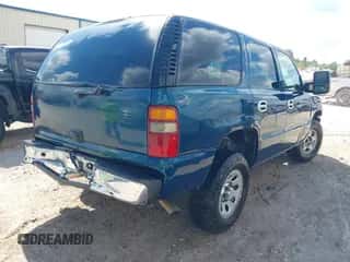 2005 Chevrolet Tahoe LS with VIN 1GNEC13V05R156852, listed as a IAAI auction lot 43274393 with 163,042 mi miles and . Bid and sale history available at DreamBid. Image 4.