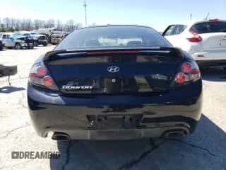 2008 Hyundai Tiburon GS с VIN KMHHM66D38U265788, выставлен на аукционе Copart как лот 48551184 с пробегом 166 754 миль миль и Списание • Salvage title. История ставок и продаж доступна на DreamBid. Изображение 6.