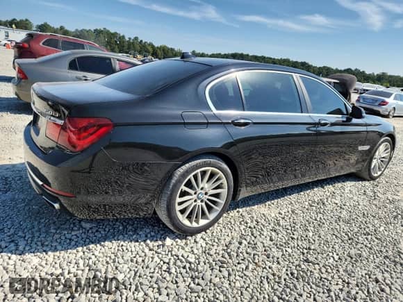 2014 BMW 7 Series ALPINA B7 xDrive с VIN WBAYF8C51ED141762, выставлен на аукционе Copart как лот 80536355 с пробегом 90 754 миль миль и Списание • Salvage title. История ставок и продаж доступна на DreamBid. Изображение 3.