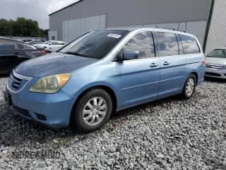 2009 Honda Odyssey EX z VIN 5FNRL38489B038582, wystawiony jako Copart lot #85501315 z przebiegiem 165 076 mil mil oraz Szkoda całkowita • Salvage title. Historia ofert i sprzedaży dostępna na DreamBid. Obrazek 1.