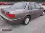 1993 Honda Accord LX z VIN JHMCB7650PC005838, wystawiony jako IAAI lot #42861998 z przebiegiem 217 028 mil mil oraz . Historia ofert i sprzedaży dostępna na DreamBid. Obrazek 4.