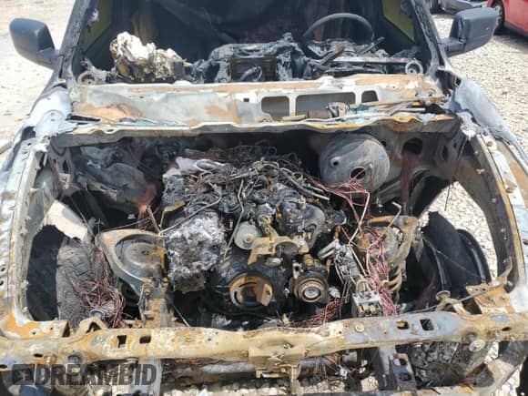 2018 Ram 1500 Tradesman z VIN 1C6RR7KM1JS262533, wystawiony jako Copart lot #55761535 z przebiegiem Nie podano mil oraz Nie do naprawy • Non repairable. Historia ofert i sprzedaży dostępna na DreamBid. Obrazek 11.