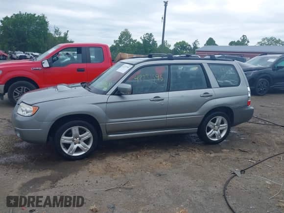 2007 Subaru Forester Special Sports XT z VIN JF1SG69637H740500, wystawiony jako IAAI lot #42231595 z przebiegiem 106 758 mil mil oraz . Historia ofert i sprzedaży dostępna na DreamBid. Obrazek 14.