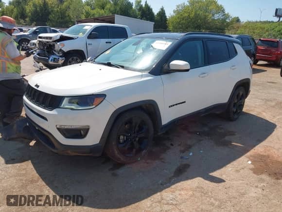 2019 Jeep Compass Altitude z VIN 3C4NJCBBXKT636725, wystawiony jako IAAI lot #43200549 z przebiegiem 99 713 mil mil oraz . Historia ofert i sprzedaży dostępna na DreamBid. Obrazek 19.