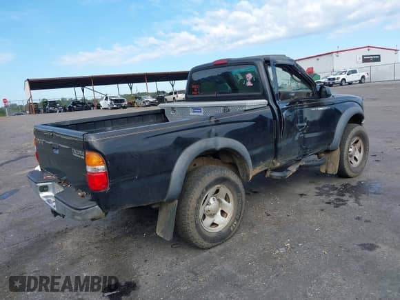 2004 Toyota Tacoma PreRunner z VIN 5TENM92N64Z381902, wystawiony jako IAAI lot #43376084 z przebiegiem 205 372 mil mil oraz . Historia ofert i sprzedaży dostępna na DreamBid. Obrazek 4.
