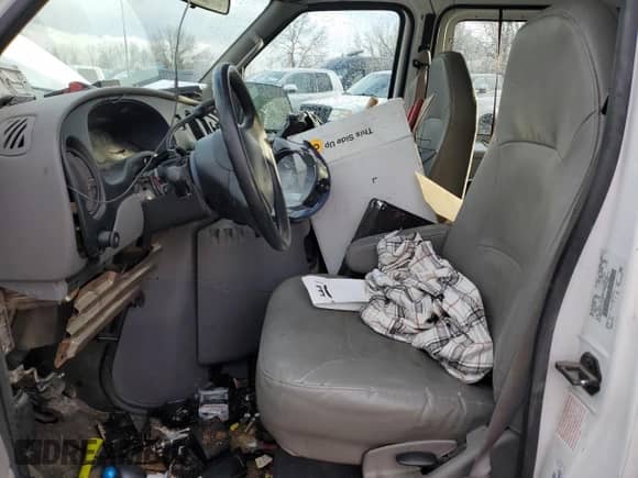 2001 Ford Econoline Cargo with VIN 1FTRE14251HA20435, listed as a Copart auction lot 44000085 with 69,015 mi miles and Salvage title. Bid and sale history available at DreamBid. Image 7.