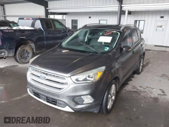 2017 Ford Escape Titanium with VIN 1FMCU9JD5HUC55301, listed as a IAAI auction lot 43359577 with 199,607 mi miles and . Bid and sale history available at DreamBid. Image 6.