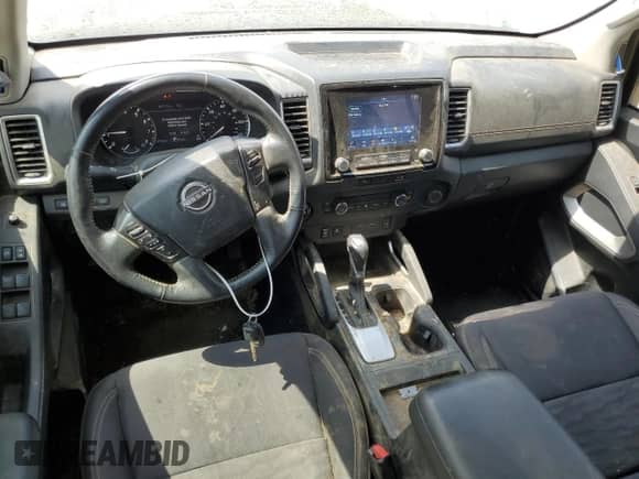 2023 Nissan Frontier SV with VIN 1N6ED1FK1PN659143, listed as a Copart auction lot 60690044 with 13,706 mi miles and Salvage title. Bid and sale history available at DreamBid. Image 8.