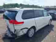 2011 Toyota Sienna XLE AAS with VIN 5TDYK3DC7BS042541, listed as a IAAI auction lot 42709220 with 134,434 mi miles and . Bid and sale history available at DreamBid. Image 4.