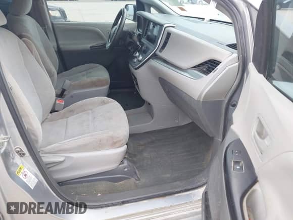 2016 Toyota Sienna L with VIN 5TDZK3DC0GS718601, listed as a IAAI auction lot 42649578 with 221,464 mi miles and . Bid and sale history available at DreamBid. Image 5.
