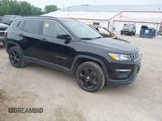 2018 Jeep Compass Latitude z VIN 3C4NJDBBXJT223563, wystawiony jako IAAI lot #42925513 z przebiegiem 107 137 mil mil oraz . Historia ofert i sprzedaży dostępna na DreamBid. Obrazek 1.