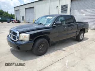 2007 Dodge Dakota SLT с VIN 1D7HE48K87S230309, выставлен на аукционе Copart как лот 62387325 с пробегом 260 827 миль миль и Списание • Salvage title. История ставок и продаж доступна на DreamBid. Изображение 1.