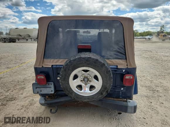 2003 Jeep Wrangler X z VIN 1J4FA39S33P356428, wystawiony jako Copart lot #70285135 z przebiegiem 147 788 mil mil oraz Szkoda całkowita • Salvage title. Historia ofert i sprzedaży dostępna na DreamBid. Obrazek 6.