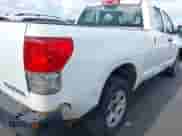 2012 Toyota Tundra z VIN 5TFRU5F10CX026554, wystawiony jako IAAI lot #43010233 z przebiegiem 221 656 mil mil oraz . Historia ofert i sprzedaży dostępna na DreamBid. Obrazek 18.