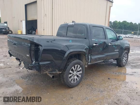 2021 Toyota Tacoma Limited with VIN 3TYGZ5AN0MT017514, listed as a IAAI auction lot 42244228 with 107,563 mi miles and . Bid and sale history available at DreamBid. Image 4.