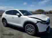 2022 Mazda CX-5 S Select z VIN JM3KFBBM2N0566257, wystawiony jako Copart lot #70037015 z przebiegiem 46 292 mil mil oraz Szkoda całkowita • Salvage title. Historia ofert i sprzedaży dostępna na DreamBid. Obrazek 4.