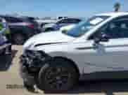 2024 Volkswagen Tiguan SE with VIN 3VVNB7AX4RM198923, listed as a IAAI auction lot 42312597 with 6,827 mi miles and . Bid and sale history available at DreamBid. Image 6.