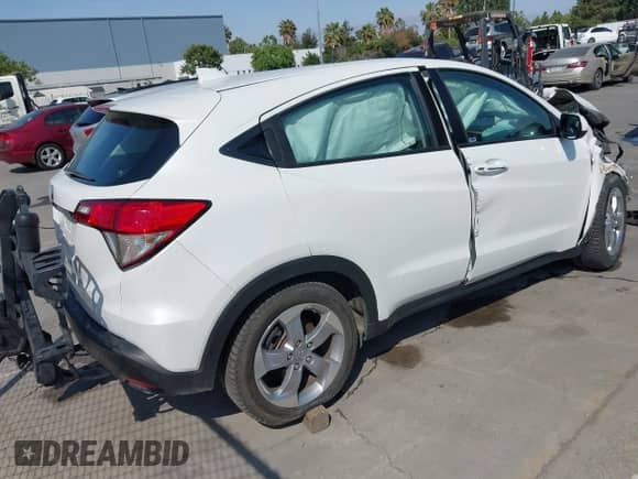 2021 Honda HR-V LX with VIN 3CZRU5H3XMM723617, listed as a IAAI auction lot 42450010 with 77,716 mi miles and . Bid and sale history available at DreamBid. Image 4.
