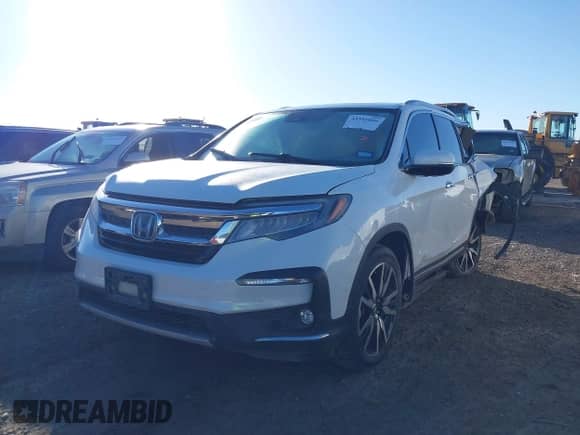 2020 Honda Pilot Touring 7-Passenger с VIN 5FNYF5H6XLB016364, выставлен на аукционе IAAI как лот 41802886 с пробегом 74 778 миль миль и . История ставок и продаж доступна на DreamBid. Изображение 19.