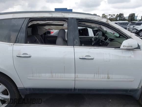 2017 Chevrolet Traverse LT z VIN 1GNKRGKD2HJ187505, wystawiony jako IAAI lot #43299284 z przebiegiem 80 256 mil mil oraz . Historia ofert i sprzedaży dostępna na DreamBid. Obrazek 21.