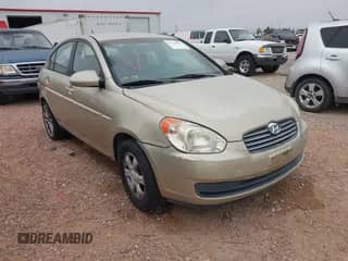 2006 Hyundai Accent GLS z VIN KMHCN46C46U057631, wystawiony jako IAAI lot #43138952 z przebiegiem 267 322 mil mil oraz . Historia ofert i sprzedaży dostępna na DreamBid. Obrazek 1.