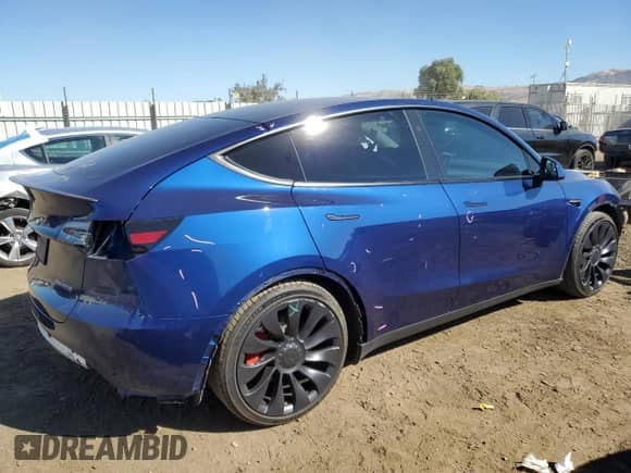 2023 Tesla Model Y Performance with VIN 7SAYGDEF6PF814946, listed as a Copart auction lot 71458794 with 16,851 mi miles and Salvage title. Bid and sale history available at DreamBid. Image 3.