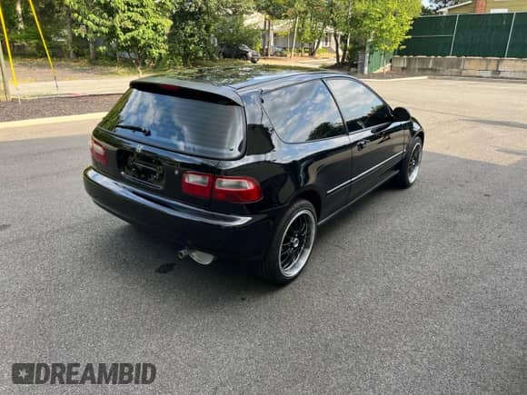 1992 Honda Civic with VIN 2HGEH2457NH561798, listed as a Copart auction lot 69810895 with 201,079 mi miles and Clean title. Bid and sale history available at DreamBid. Image 4.