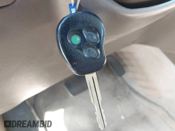 1999 Toyota Camry LE z VIN JT2BF28K7X0215290, wystawiony jako IAAI lot #43498604 z przebiegiem 166 636 mil mil oraz . Historia ofert i sprzedaży dostępna na DreamBid. Obrazek 11.