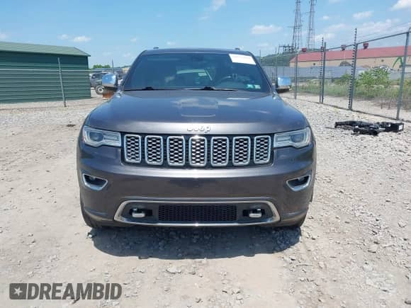 2017 Jeep Grand Cherokee Overland with VIN 1C4RJFCG0HC778681, listed as a IAAI auction lot 42573123 with 83,616 mi miles and . Bid and sale history available at DreamBid. Image 12.