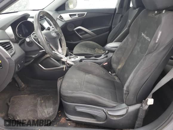 2014 Hyundai Veloster z VIN KMHTC6AD8EU196161, wystawiony jako Copart lot #82244385 z przebiegiem 146 717 mil mil oraz Czysty tytuł • Clean title. Historia ofert i sprzedaży dostępna na DreamBid. Obrazek 7.