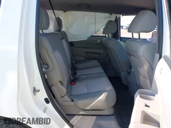 2013 Honda Pilot LX with VIN 5FNYF3H2XDB040697, listed as a IAAI auction lot 43176116 with 142,522 mi miles and . Bid and sale history available at DreamBid. Image 8.