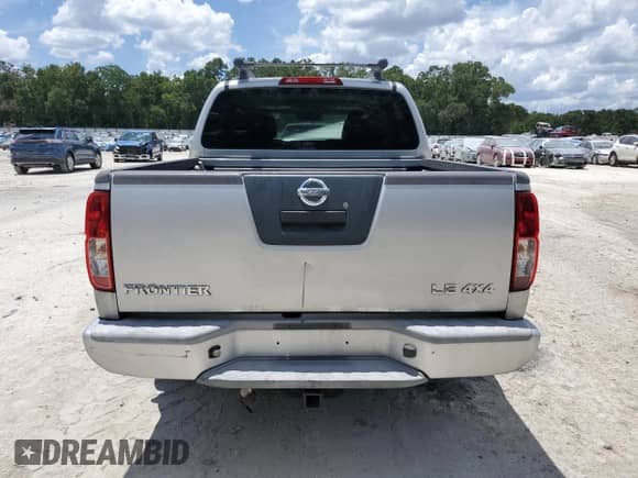 2007 Nissan Frontier LE with VIN 1N6AD07W07C436033, listed as a Copart auction lot 61941775 with 177,304 mi miles and Salvage title. Bid and sale history available at DreamBid. Image 6.